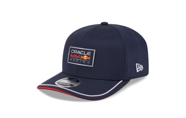 Step into race day with bold heritage and clean lines in this Red Bull Racing 9SEVENTY Dynasty Cap by New Era. Featuring a structured retro fit, flat visor, and an embroidered team crest, this cap combines classic snapback styling with modern Red Bull Racing attitude.