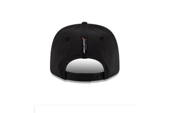 Front Panel: The cap sports a striking white front panel with black and red accents, giving it a sleek, aerodynamic look inspired by McLaren’s livery. The McLaren Speedmark logo is prominently displayed in black, contrasting against the white background with a dynamic, speed-line graphic effect. Fit & Comfort: This is a New Era 9SEVENTY "Stretch-Snap" cap, meaning it combines a structured snapback closure with stretch-fit fabric for enhanced comfort and adjustability. Back Design: The inside label confirms its official McLaren F1 Team merchandise status, ensuring authenticity.