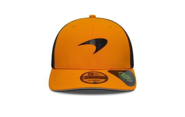 McLaren Racing 9SEVENTY Stretch Snap Cap in orange, with Speedmark logo on the front. Speedmark McLaren Racing logo on the front McLaren Racing label on the rear arch Oscar Piastri logo on the bottom of the visor New Era logo embroidered on the left side Structured crown Adjustable Stretch Snap Closure Curved visor Mesh rear panels Made with recycled materials (90% recycled polyester, 10% elastane)