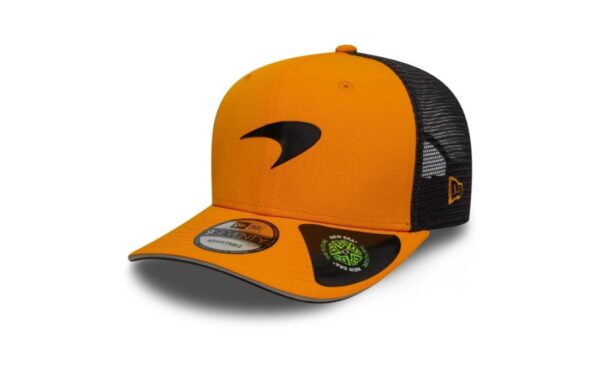 McLaren Racing 9SEVENTY Stretch Snap Cap in orange, with Speedmark logo on the front. Speedmark McLaren Racing logo on the front McLaren Racing label on the rear arch Oscar Piastri logo on the bottom of the visor New Era logo embroidered on the left side Structured crown Adjustable Stretch Snap Closure Curved visor Mesh rear panels Made with recycled materials (90% recycled polyester, 10% elastane)
