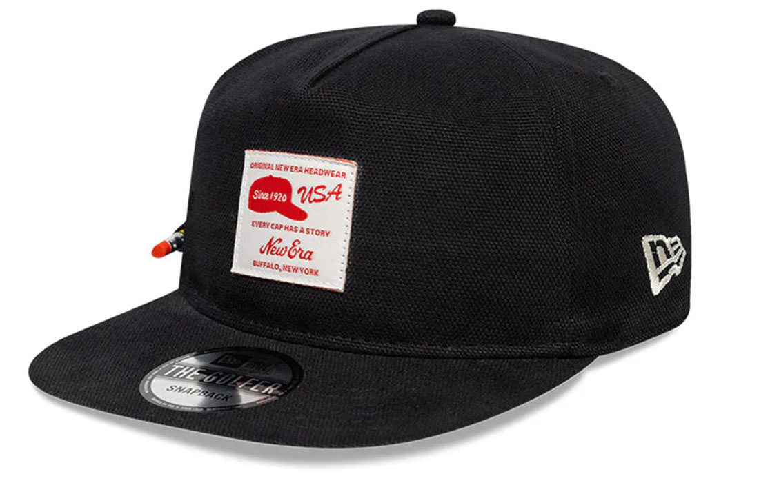 60595142_GOLFER_NEWERA_BLK_ side Golfer Snapback New Era Flag embroidered on left Pencil Holder on right, pencil included Unstructured Crown Strapback Flat Visor 100% COTTON Product ID: 60595142
