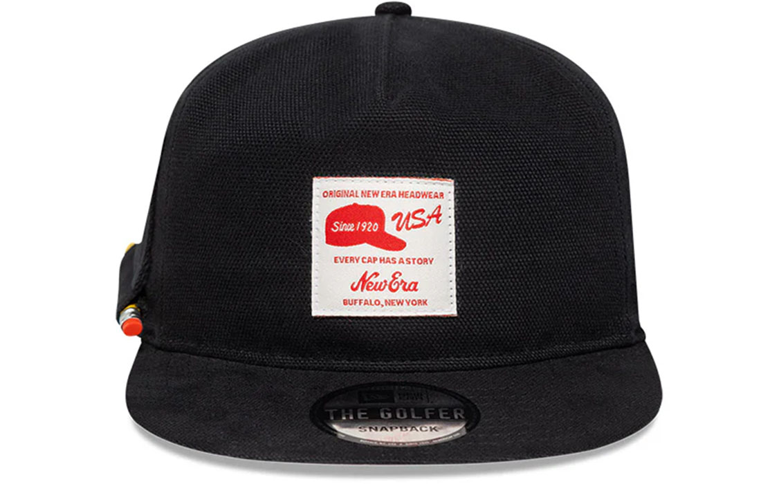 60595142_GOLFER_NEWERA_BLK_F front Golfer Snapback New Era Flag embroidered on left Pencil Holder on right, pencil included Unstructured Crown Strapback Flat Visor 100% COTTON Product ID: 60595142