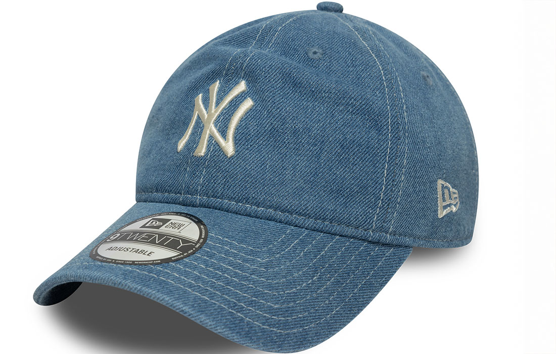 60667563_side MLB Denim New York Yankees 9TWENTY Cap New York Yankees midi logo on front New Era Flag embroidered on left Unstructured crown Strapback Curved visor Made with denim fabric 42.6% COTTON, 34.7% POLYESTER, 17.4% VISCOSE, 3% ACRYLIC, 2.3% POLYAMIDE
