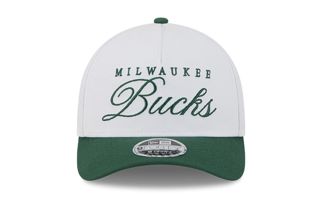 60673555_9FORTYMCAF_NBA25DRAFT940MCAF_MILBUC_OTC_F front The 9FORTY M-Crown has a semi-full shape that sits higher than the original 9FORTY MICROERA™ technology acts as an anti-microbial to reduce odor Embroidered graphics with raised details Five panels with A-frame pinched front One size fits most Contrast-color undervisor Printed stripes on front panel Material: 94% Polyester/6% Spandex