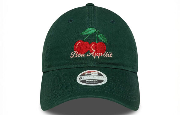 Women New Era Phrase Dark Green 9TWENTY Cap Cherry graphic with Bon Appetit (Enjoy Your Meal) wordmark in French on front New Era Flag embroidered on left Unstructured crown Strapback Curved visor 100% COTTON Product ID: 60691298